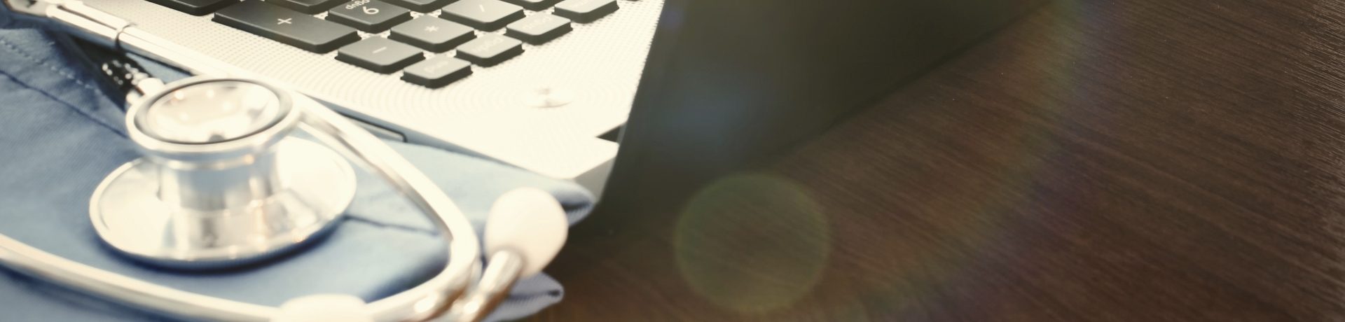 Doctor hand working with laptop computer